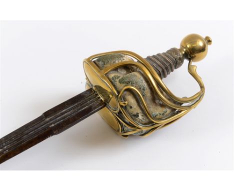 A SCHIAVONA STYLE RAPIER the 81cm double-edged straight steel blade triple-fullered at the forte, with a brass sweeping wirew