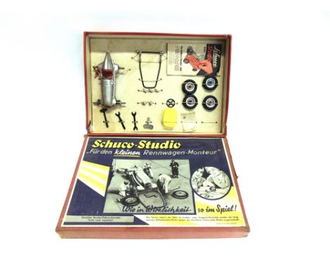 A SCHUCO STUDIO 1050 MERCEDES-BENX RACING CAR CONSTRUCTION KIT  silver with racing number '7', complete with most parts and f