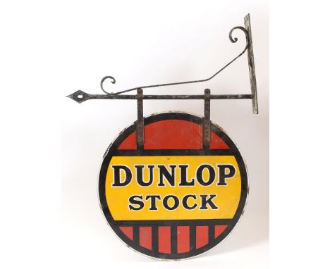A DUNLOP DOUBLE-SIDED ENAMEL SIGN  'Dunlop Stock', with black lettering against a red, yellow and black ground, 46cm x 46cm (
