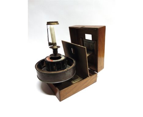 A PRAXINOSCOPE THEATRE, BY E.R. [RAYNAUD], PARIS  circa 1880, comprising a 21.5cm diameter drum with a twelve-section mirrore