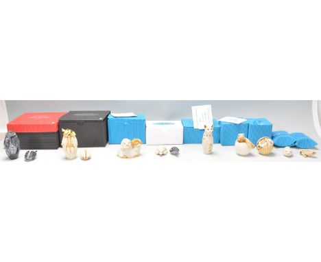 A collection of twelve&nbsp; Adam Binder mostly animals related netsuke style figurines to include a hatching egg, frog, a pi