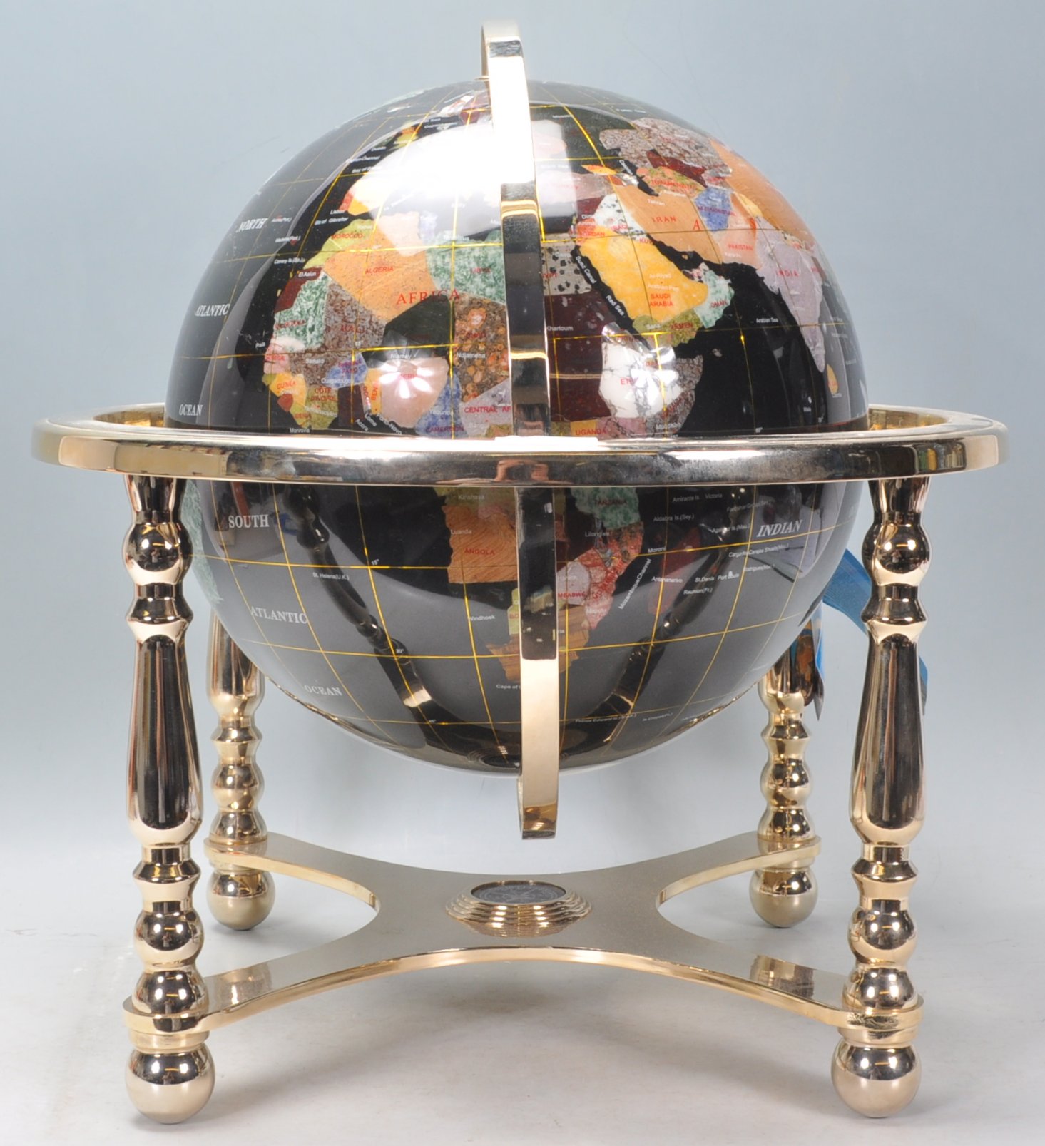 A vintage 20th century large terrestrial globe having semi precious