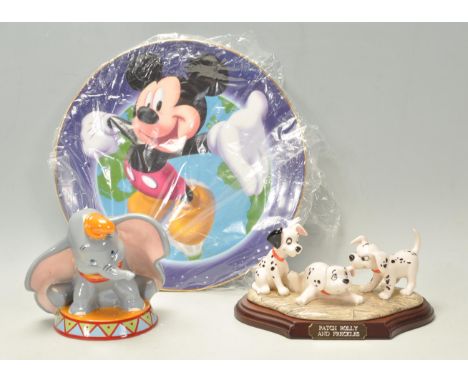 A group of three Disney Royal Doulton ceramic figures and plate to include The Mickey Mouse Collection Mickey Welcomes The Mi
