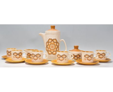 A vintage retro 20th Century Royal Worcester Palissy pattern coffee service compressing of six coffee cans and saucers, coffe