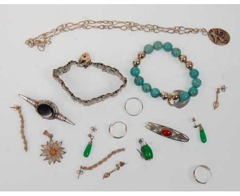 A collection of vintage silver jewellery to include a heart lock gate link bracelet, a silver and onyx brooch, a bar brooch s