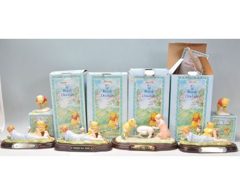 A group of six Royal Doulton ceramic figures from 'The Winnie The Pooh Collection' to include figures Winnie The Pooh And The