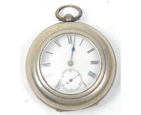 A 19th Century Victorian silver hallmarked open faced pocket watch having a round white enamelled face with roman numerals to
