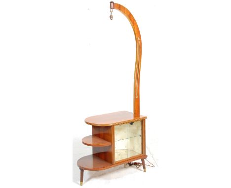 A vintage mid 20th Century 1950's cocktail cabinet and lamp combination having a glazed cabinet with three demi lune shelves 