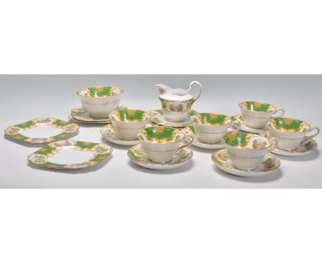 A good vintage 20th Century&nbsp;bone china tea service by Lawleys of Regent St having printed countryside scenes with gilt d