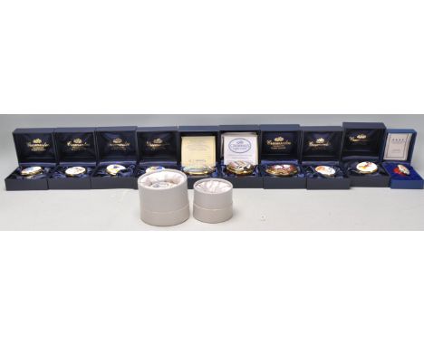 A collection of Crummles hand painted enamelled boxes to include a selection of Disney boxes, an oval box enamelled with the 