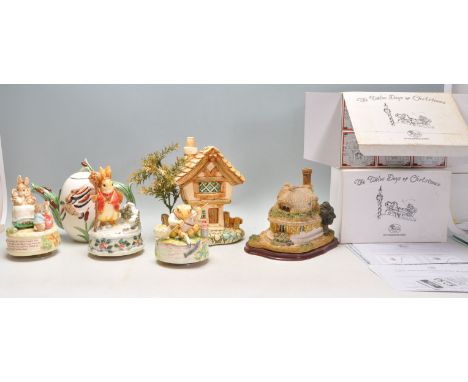 A mixed group of mostly ceramic figures to include 3x Beatrix Potter Musical figures, teapot with molded floral dealing, Pend