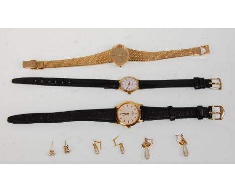 A group of three vintage ladies watches to include an Avia 1970's gilt bark effect watch, with two Rotary cocktail watches an
