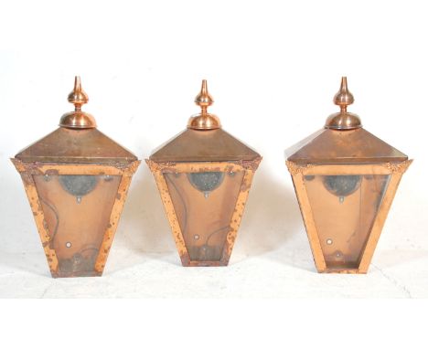 A group of three Victorian style street lantern light fittings constructed from copper with bulbous finials to the tops. Heig