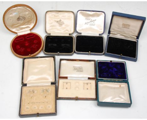 A good group of seven vintage cufflink &amp; stud leather boxes with most having gilt tooled decoration with velvet and silk 