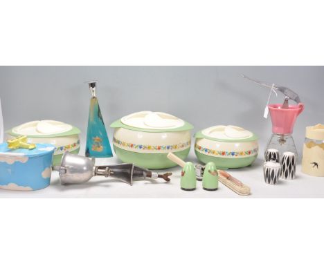 A good mixed collection of vintage and retro kitchen wares to include a graduating set of three plastic tureens by Jigar, con