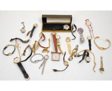 A good mix group of ladies and gentlemen's wrist watches with many set to leather straps and other gold tone bracelets, stain