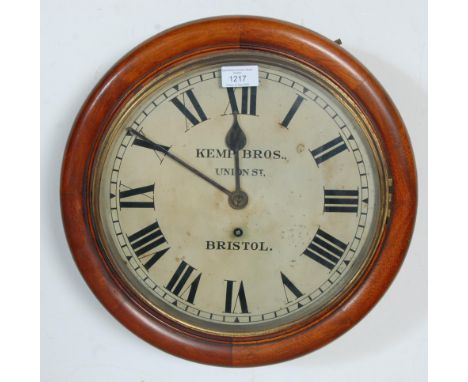 A late 19th / early 20th Century mahogany cased station&nbsp;wall clock having a round face with roman numerals to the chapte