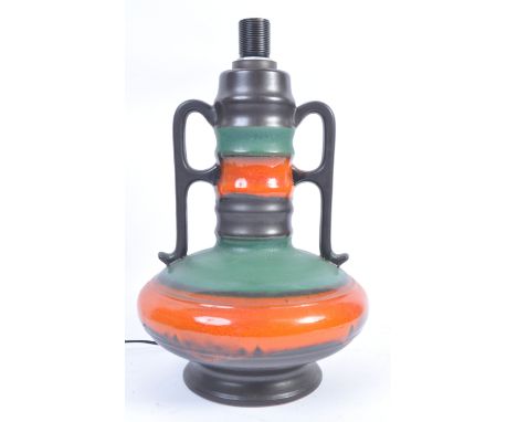 Walter Gerhard - W. German - A 20th Century retro vintage studio art pottery terracotta lamp base having twin handles ribbed 