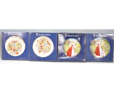 A group of Royal Doulton boxed ceramic cabinet plates to include 2x Bunnykins Help Santa PN157 and 2x Amy plates PN69.&nbsp;&