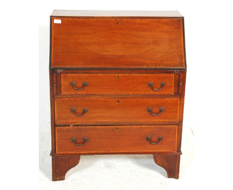 An Edwardian&nbsp; mahogany inlaid fall front bureau desk having satin wood inlay with a fall front desk with sectional inter