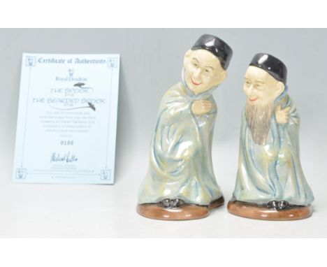 A pair of Royal Doulton ceramic character jugs to include 'The Spook' D7132 and 'The Bearded Spook' D7133. With certificate.&