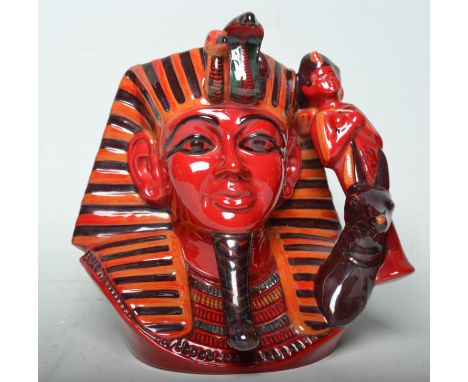 Flambe - A Royal Doulton ceramic Character / Toby jug The Pharaoh D7028 in the Flambe pattern. Marks to base and being 655 / 