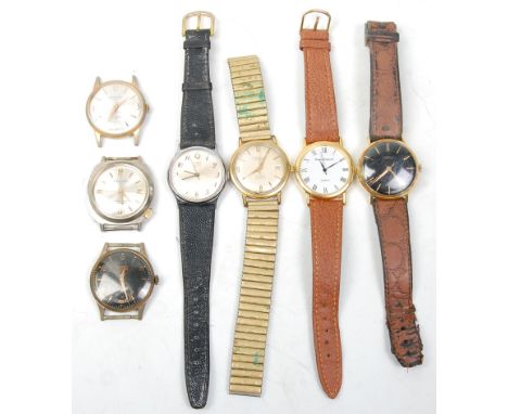A group of seven vintage gentleman's wrist watches to include a Roamer watch having a round face with gilt baton markings to 