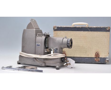 A vintage retro Samoca Roman Slide projector having a 5 inch ezumar anastigmat f3.0 lens complete with its original fitted ca