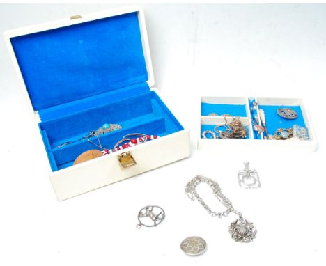 A collection of vintage costume / fashion jewellery to include a selection of Scottish celtic brooches, a filigree brooch set
