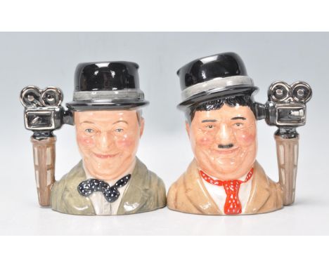 Laurel &amp; Hardy - Two Royal Doulton ceramic Character / Toby jugs one of Stan Laurel D7008 and Oliver Hardy D7009. Both li