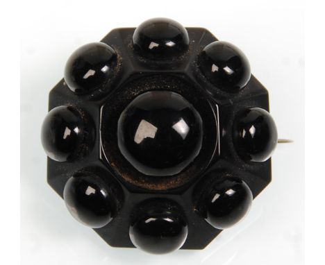 A good 19th Century Victorian large vintage Whitby Jet brooch of octagonal form having ball decoration and pin to verso.&nbsp