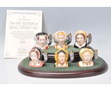 A group of six Royal Doulton ceramic Character / Toby jugs for the Six Wives Of King Henry VIII Tinies to include Anne Boleyn