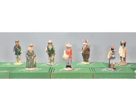 A group of seven Beswick ceramic figurines to include Huntsman Fox, the Lady Pig, Fisherman Otter, Garden Rabbit, Gentleman P