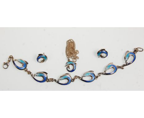 A silver hallmarked and enamelled demi-parure necklace, bracelet and earrings set in the the form of dolphins with varying sh