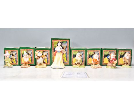 A complete set of eight Royal Doulton ceramic figures for the snow white series 616 to include Sleepy SW 7, DOC SW 2, Grumpy 