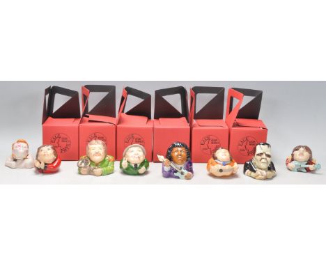 A collection of eight mostly music related ceramic Kevin Francis face pots to include David Bowie, 'I can's get no Satisfacti