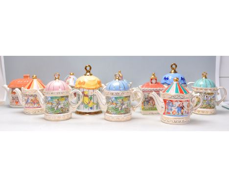 A good collection of ten mostly Saddler made collectors teapots to include many hunting examples, bird within a cage, Circus,