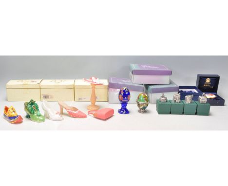 A mixed group of mostly resin ornaments to include various ladies shoes, decorative egg ornaments one by Fenton, four metal W