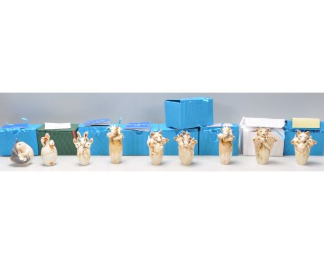 A collection of Adam Binder animals related netsuke style figurines to include a group of ducks, kangaroos, giraffe's, zebra'