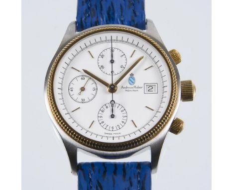             Armbanduhr-Chronograph von ChronoswissANDREAS HUBER. Edelstahl, Gold-Lünette. ø 40 mm. 77 Gramm.             Auto