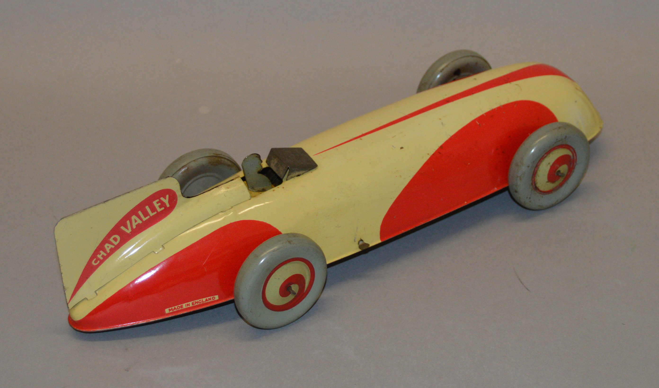 An unboxed tinplate Chad Valley streamlined Racing Car model ...