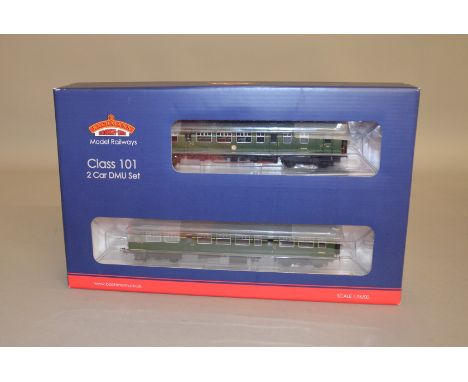 OO Gauge. A boxed Bachmann 32-286 (DCC Ready 21 Pin) MCW Class 101 2 car DMU Set in BR green with yellow warning panels, appe