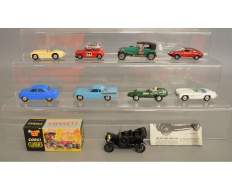 7 unboxed Corgi Toys cars including an Austin Healey in cream, missing screen, a motorised version of the Ford Consul in blue