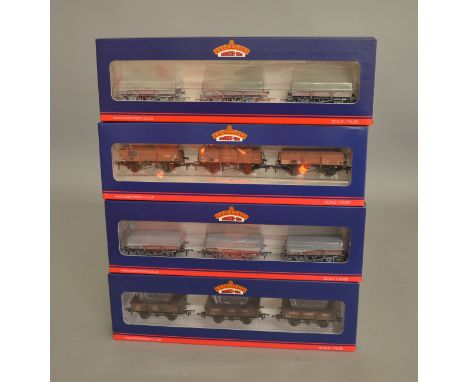 OO Gauge. 4 boxed Bachmann three 'weathered' Wagon sets, two of which, 33-080X and 33-080Y, contain BR Bauxite China Clay Wag