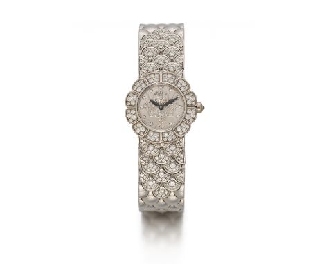 PATEK PHILIPPESchmuckuhr.Herkunft: Schweiz, Genf. Datierung: 2000. Werk: Quarz, Cal. E15. Gehäuse/Armband:  750/- Weißgold, m