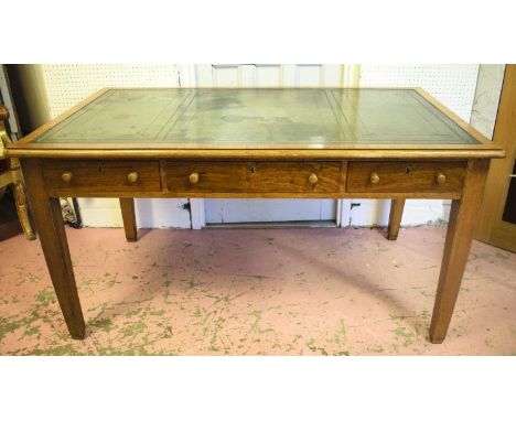 WRITING TABLE, 79cm H x 152cm W x 91cm D, early 20th century oak and pollard oak, with green leather top above three drawers.