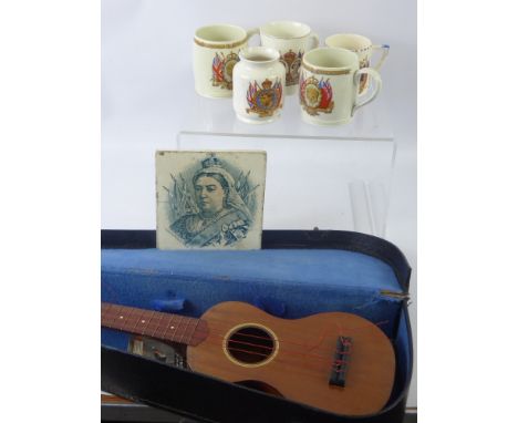 A Miscellaneous Collection of Items, including Queen Victoria commemoration tile, four commemoration mugs with a vase, 1937 M