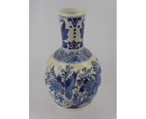 A Dutch Delft Blue and White Vase, mm KB and further incised marks, approx 22 cms, hand painted with birds amongst flowers .