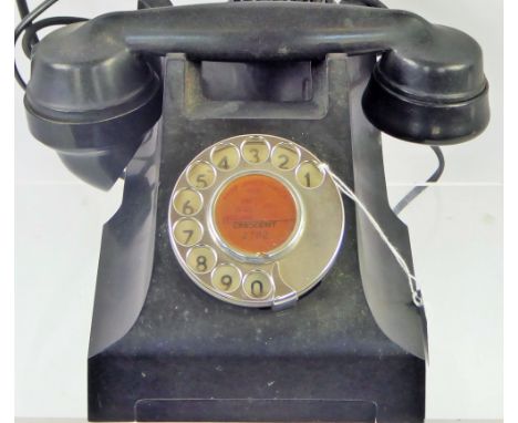 A Vintage circa 1950's Rotary Dial Telephone.