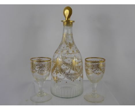 A Late 18th Century Cut Glass Decanter and Stopper, with decorative swag gilding, and six matching glasses. (af)